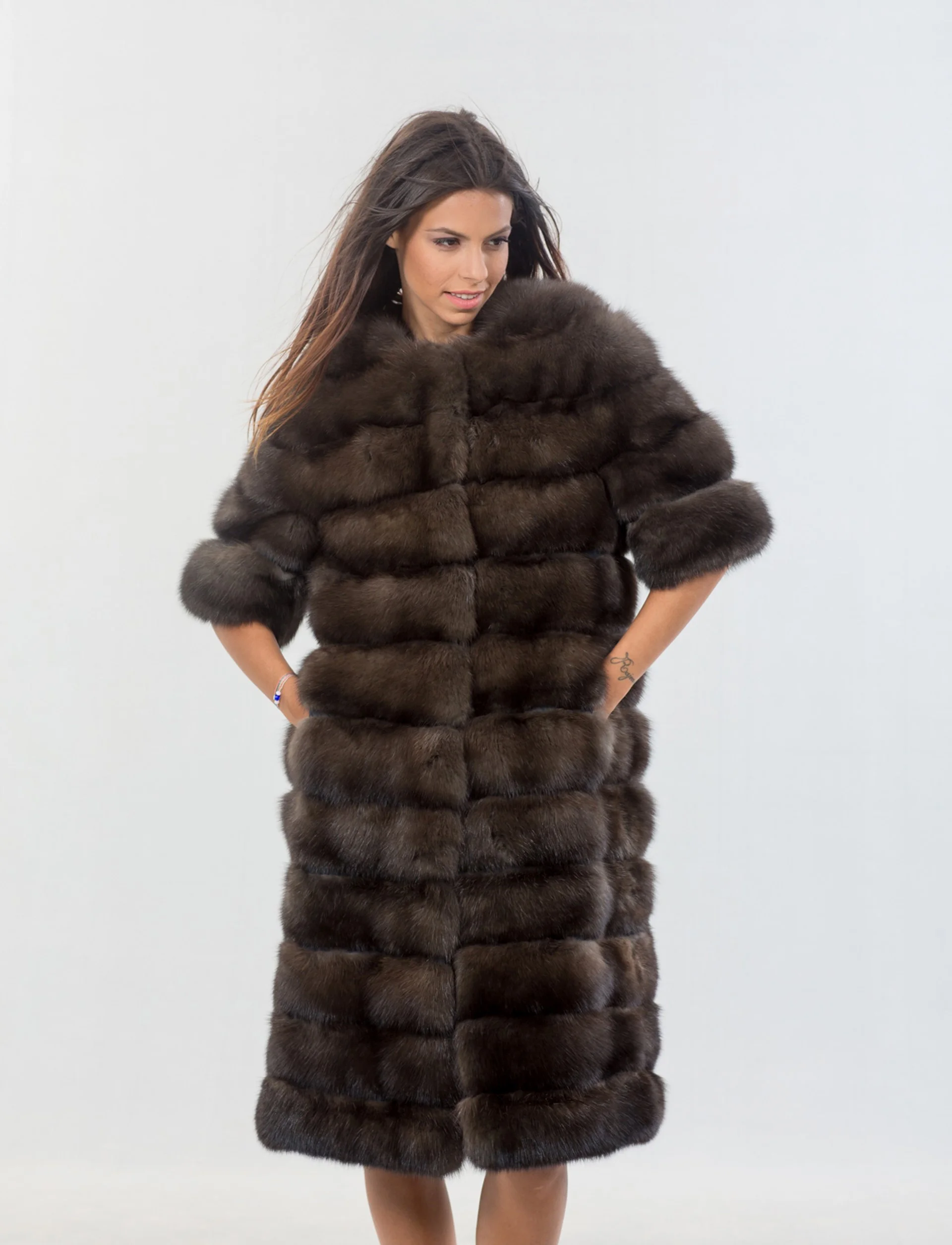 

Women's sable fur coat. Luxurious coat made of Russian sable in a natural color, elegant and comfortable, perfect for winter hol