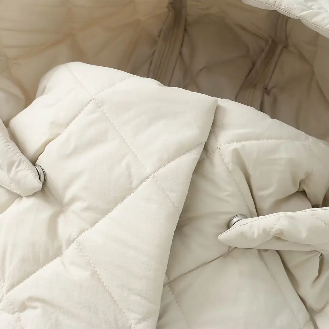 Abbigliamento donna 2025 autunno e inverno nuova giacca lunga in cotone con cappello rimovibile a collo alto in stile europeo e americano