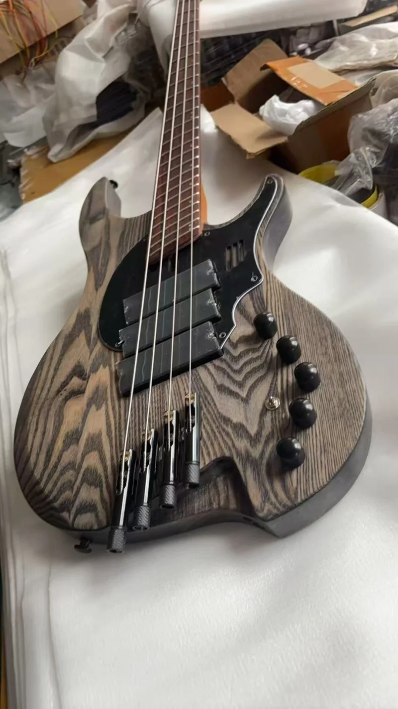 4-string neckless electric bass, rosewood fan-shaped fretboard, 34 and 37 inch scale, roasted maple neck, powered electronic