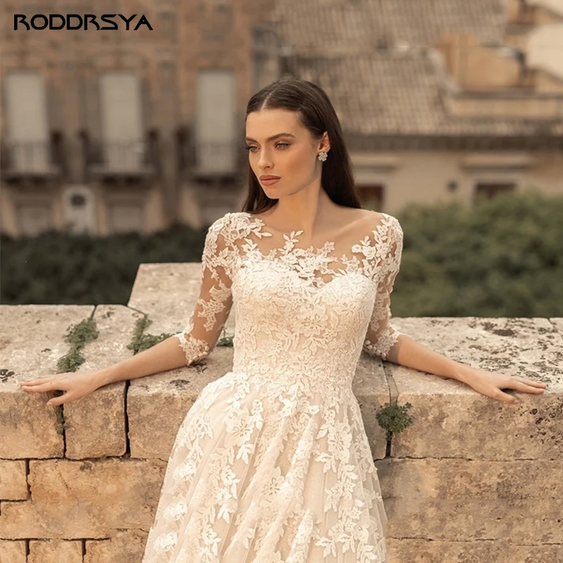 RODDRSYA خمر فستان الزفاف مغرفة الرقبة الدانتيل الأكمام أثواب العروس يزين قطار الاجتياح بوهو vestidos de novia مخصصةRoddrsya خمر ثوب الزفاف مع كبير العنق 3 / 4 الدانتيل كم فستان العروس الشارات اكتساح قطار بوهيميا سترة