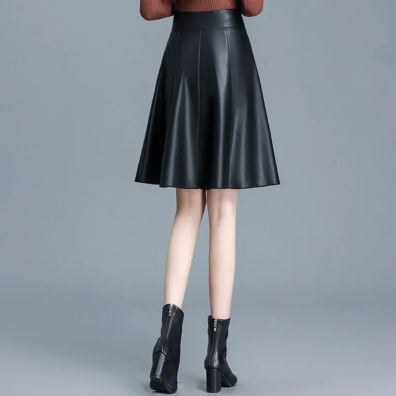 خريف شتاء بولي Leather تنورة جلدية صغيرة ألف خط ميدي تنورة عصرية متعددة الاستخدامات قصيرة عالية الخصر التخسيس مطوي التنانير