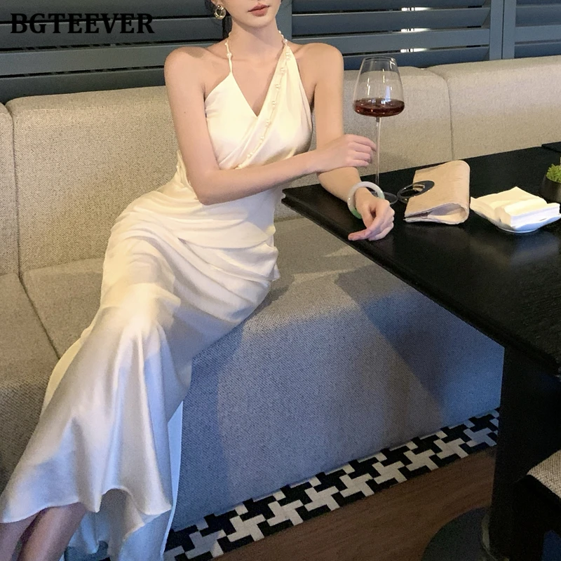 BGTEEVER エレガントなホルターパールノースリーブパッケージヒップサテンドレス女性のための春夏ファッションスリムウエストレディーススキニードレス