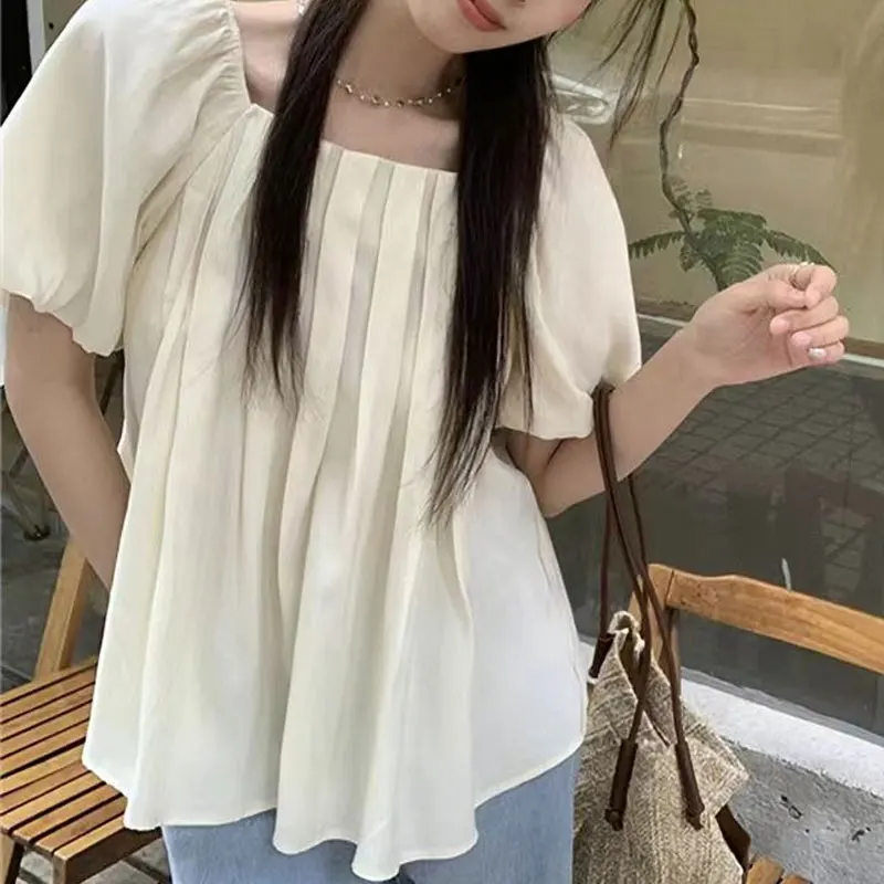 Chemisier à col carré pour femmes, vêtements de Style français, manches bouffantes, nouvelle couleur unie, chemises amples à la mode, pliables, été