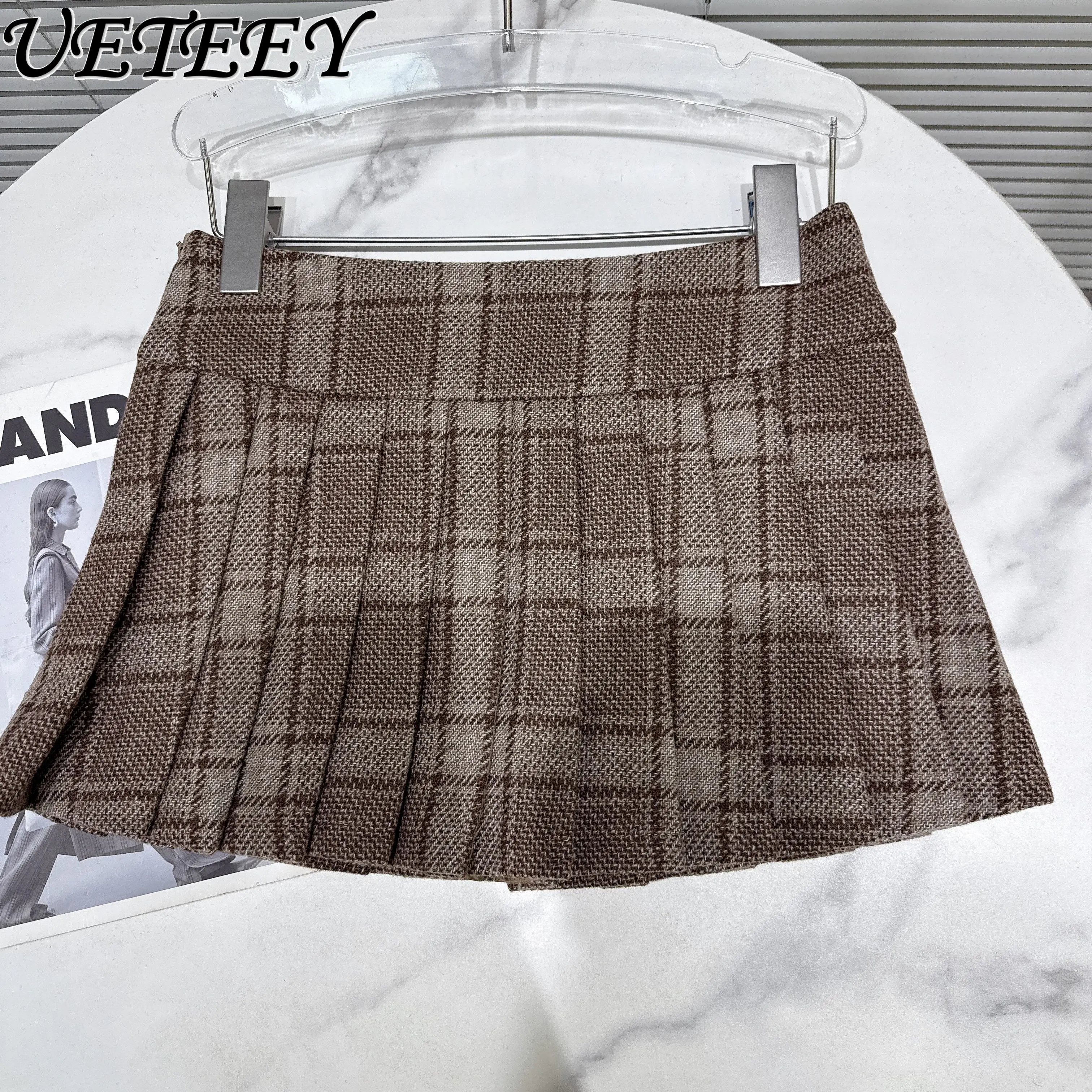 2025 خريف جديد كلية نمط الكاكي منقوشة التنانير النساء موضة المضادة للتعرض الصوفية قصيرة تنورة صغيرة مطوي تنورة للطلاب