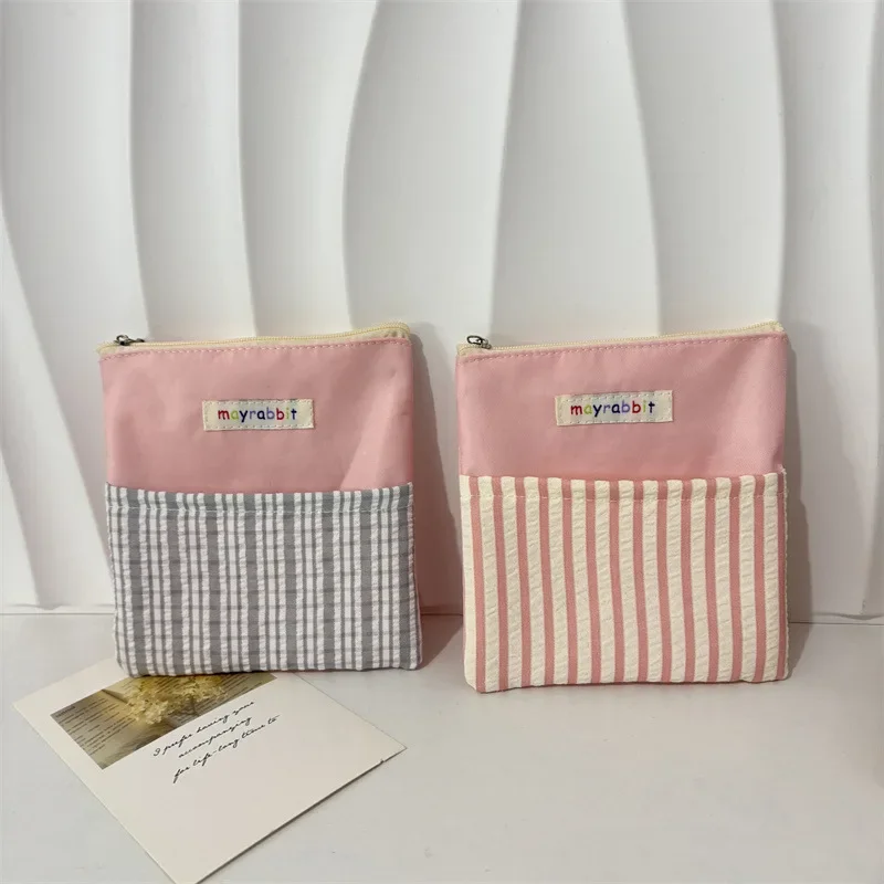 女の子のための韓国の口紅メイクアップバッグ,無地の縞模様のコインバッグ,学生のためのミニポケット,ファッション,1個