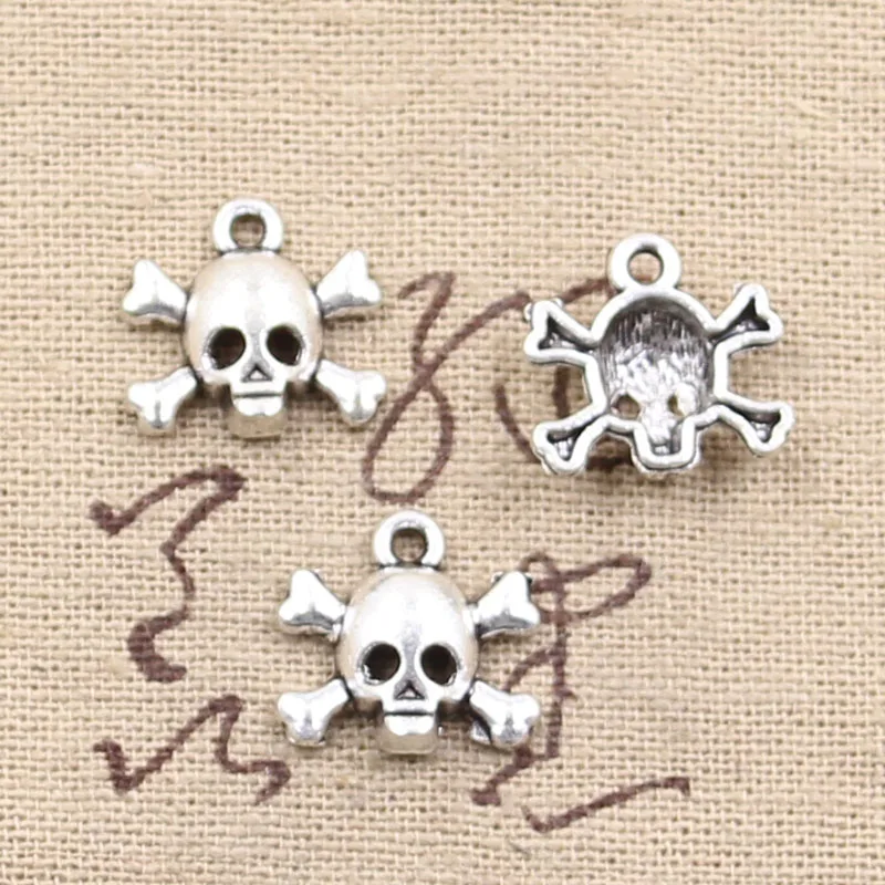 30 sztuk Charms czaszka szkielet kość głowa 15x14mm antyczny brąz srebrny kolor wisiorki dokonywanie DIY Handmade biżuteria tybetańska