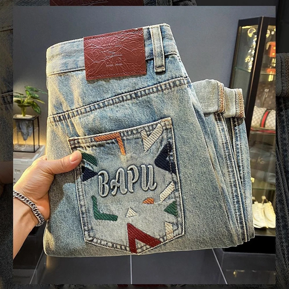 夏の新メンズソリッドカラーハーレムスキニージーンズアメリカンレトロファッショントレンドストリートヒップホップカジュアル通気性メンズボトムス