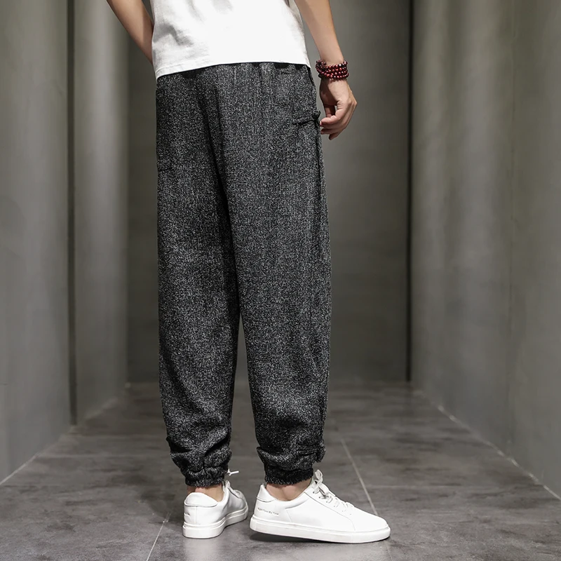 Pantaloni Harem con fibbia a disco di tendenza primaverile ed estiva pantaloni da uomo in cotone traspirante con fibbia da uomo pantaloni Casual alla moda