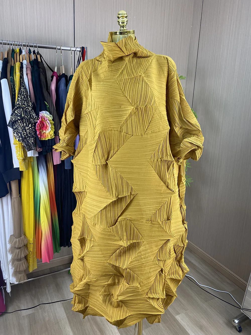 Women's casual, loose-fit, plus-size asymmetrical dress featuring a stylish, unique pleated design and a waist belt.-GZXX1148