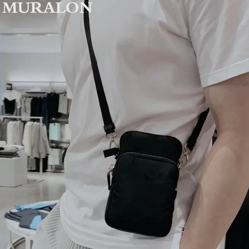 Nylon splicing couro bolsa de couro para homens e mulheres, mini bolsa crossbody, luxo simples lazer multifunções pequena bolsa de ombro