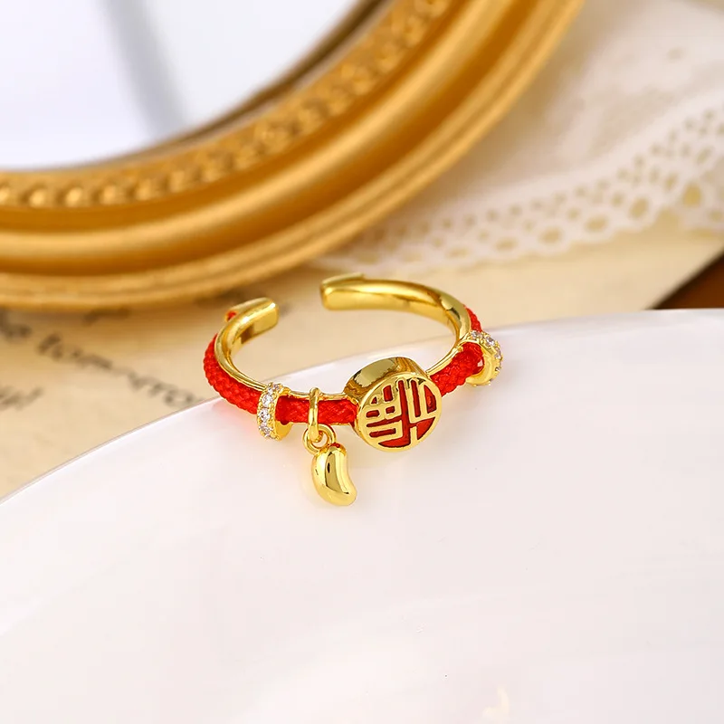 

Lucky Red Cord Ring with Gold Zodiac Pendant Asian-Inspired Adjustable Boho Chic Statement Ring for Her Unique Spiritual Jewelry