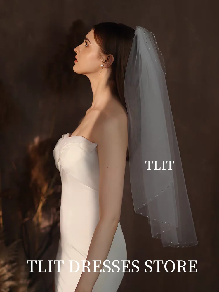 TLIT Элегантный однослойный свадебный головной убор с фатой длиной до локтя и жемчугом с обрезанным краем по краю по индивидуальному заказу для женщин