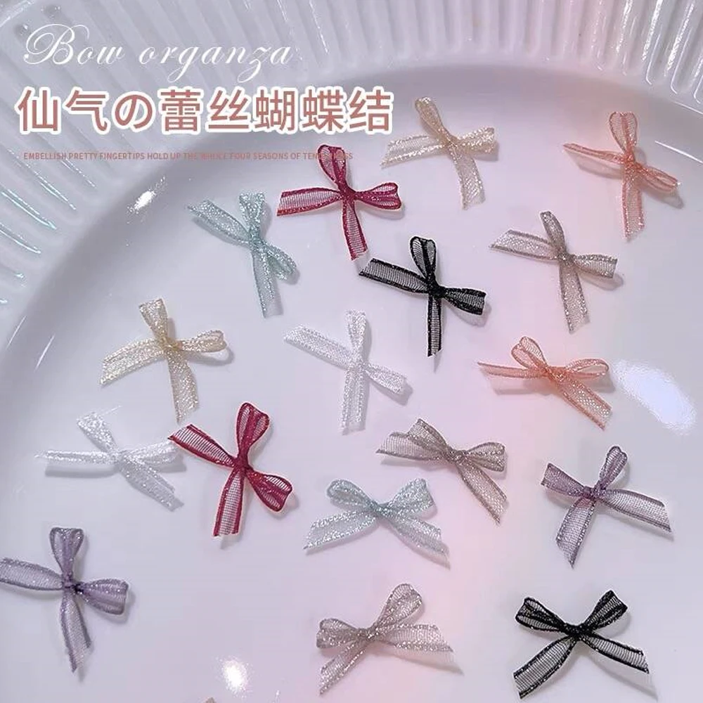 20 sztuk Hollow Out Organza Bow Nail Charms biały/różowy/czerwony słodki koreański Bowknot ozdoby do paznokci wstążka eleganckie akcesoria do Manicure