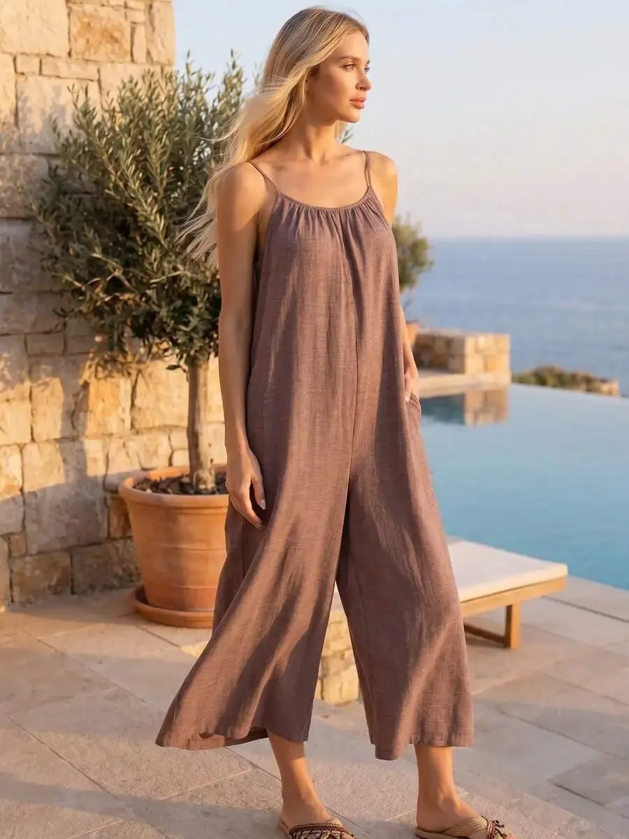 

Women Solid Color Sleeveless Ruched Backless Loose Jumpsuit With Pockets Wide Leg Pants Beach Vacation Loungewear