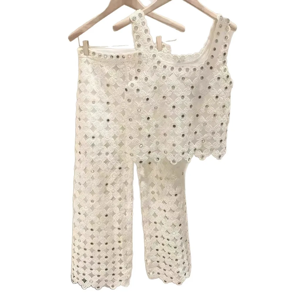 

Женский вязаный костюм с ажурным узором: топ без рукавов с квадратным вырезом + повседневные брюки с широкими штанинами, новинка весны 2026