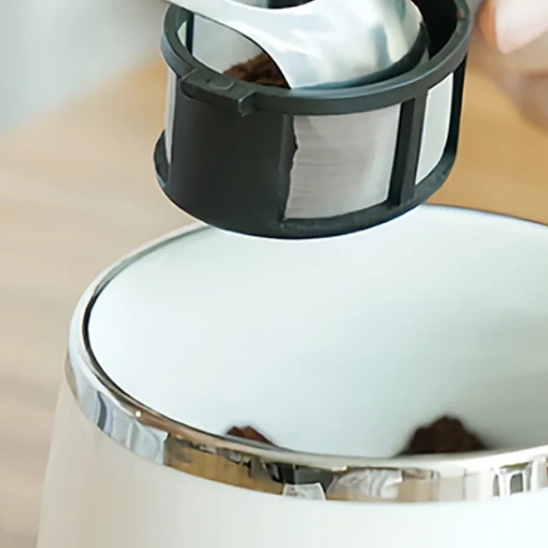 

Кофейная капсула, порошок, фильтр, ложка, заварочный чайник, многоразовый ситечко для вкладышей, мешок