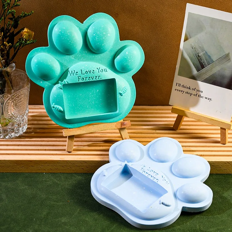 Clay mold, featuring animal claw patterns, is hand-cast from plaster and is used for creating decorative molds for tabletops.