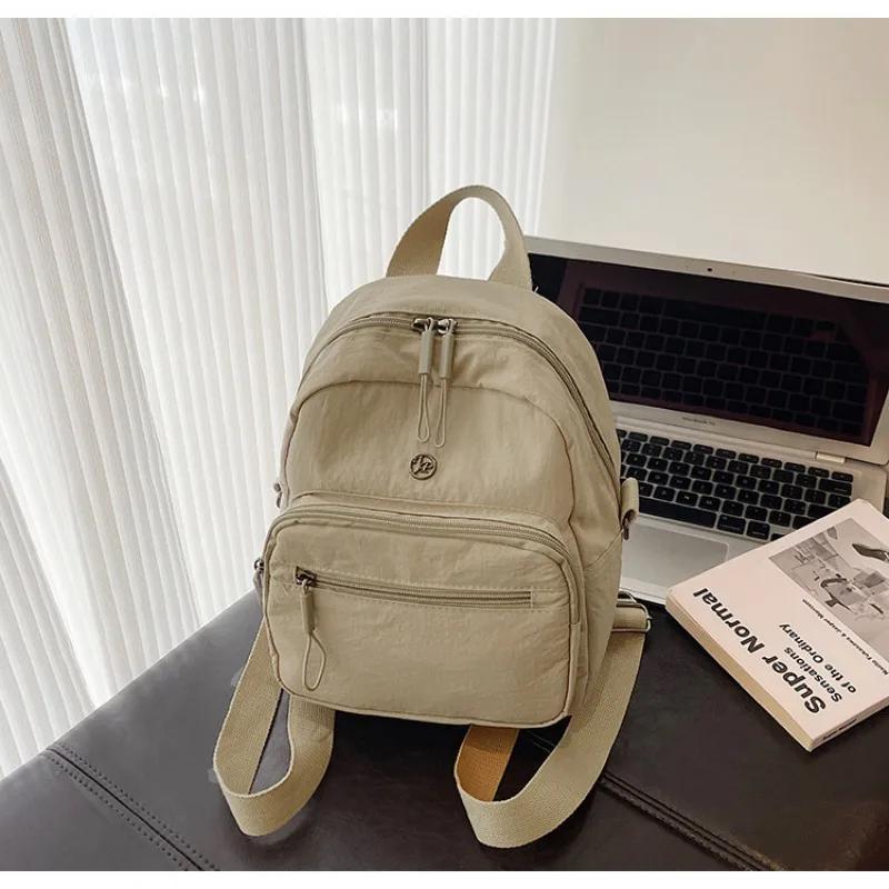 

Новый нейлоновый рюкзак с несколькими карманами, простая, легкая и универсальная модная повседневная сумка