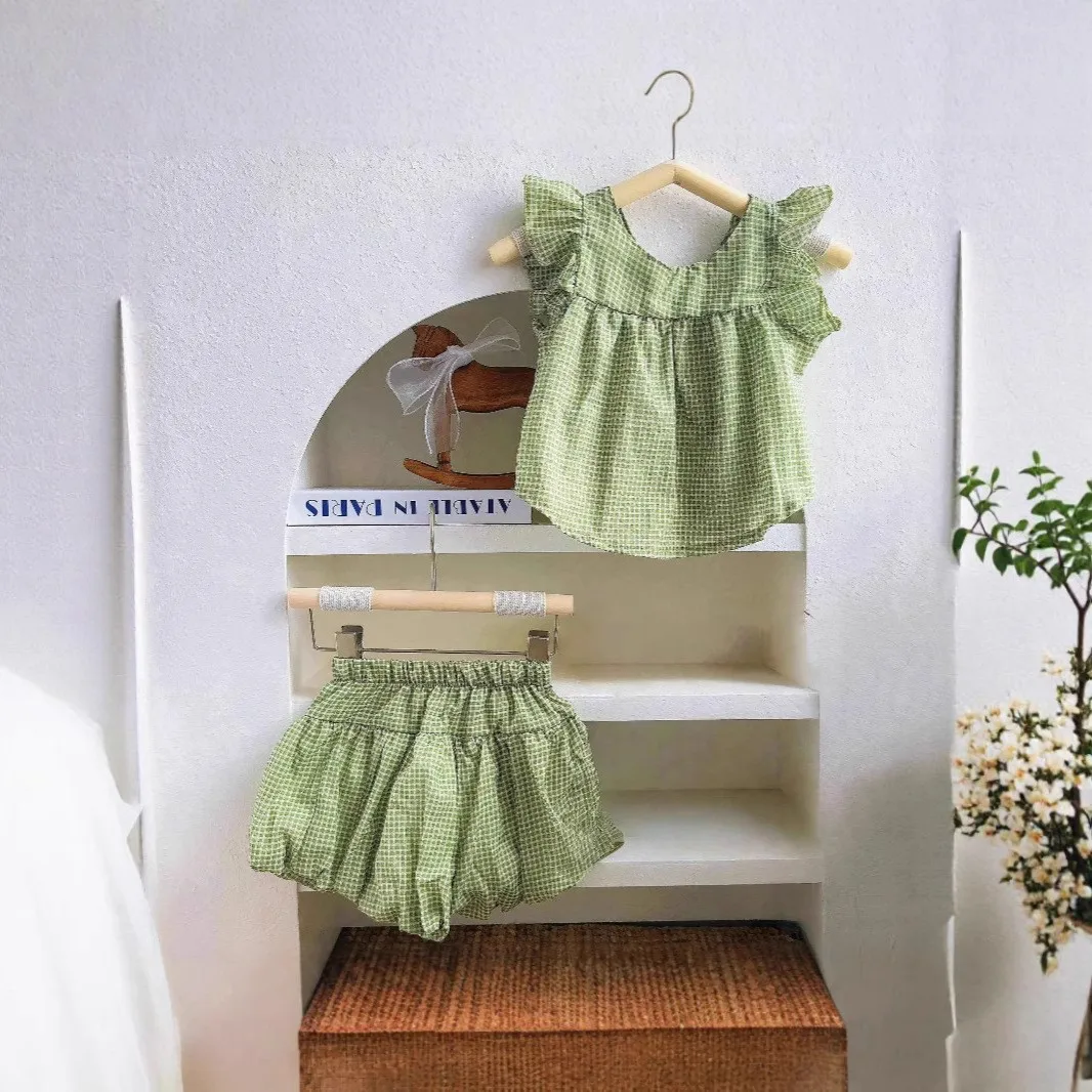 

New Korean style children's clothing summer girls' fresh casual plaid flying sleeve round neck doll shirt Bud shorts suit