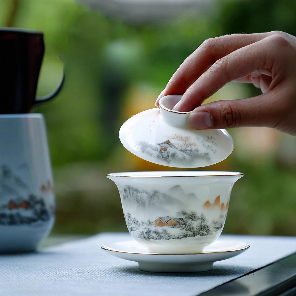 Suet jade tea set High-end household ceramic teapot Office Kung Fu tea set Tea cup gift box set