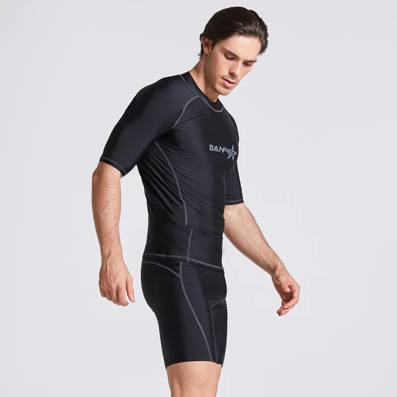 Nowe krótkie rękawy czarny Nylon Spandex Stretch szybkoschnąca wysypka kamizelki pływackie strój do surfingu rashguardy do nurkowania dla mężczyzn