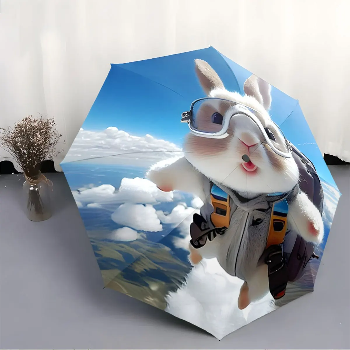 

Automatic Folding Umbrella A bunny skydiving. Portable collapsible design, casual outdoor accessory, for all seasons, Christma