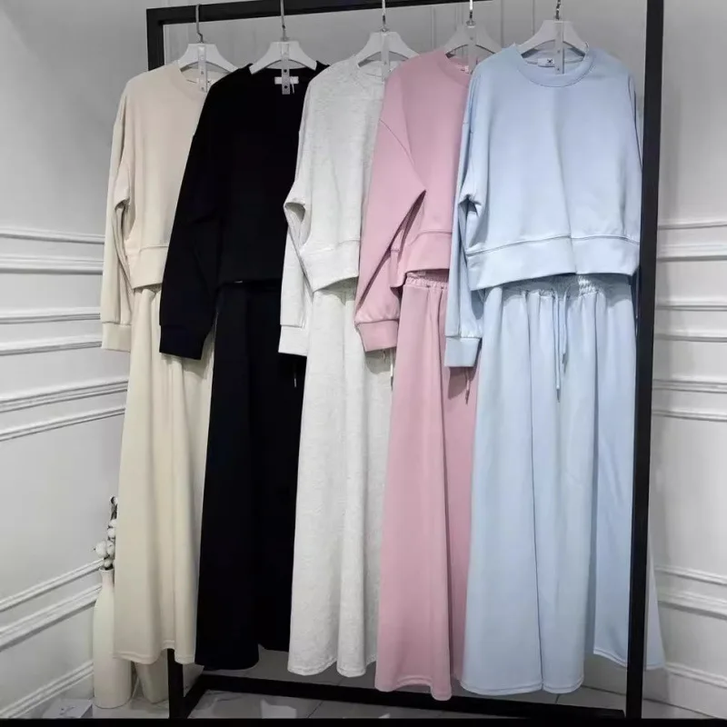 

SuperAen 2025 Новый женский однотонный вязаный свитшот в европейском и американском стиле с круглым вырезом, длинная юбка трапециевидной формы, модные комплекты