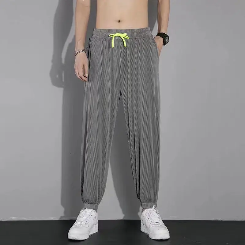 Pantaloni casual larghi sportivi sottili estivi da uomo in seta di ghiaccio Qui Dry Pantaloni lunghi leggeri a gamba dritta Faionable coreano Sle