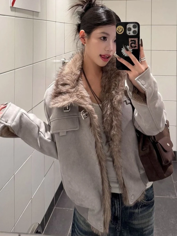 

Американская ретро-куртка из оленьей замши с меховым воротником, утепленная, короткая, с флокированным покрытием, стильная и элегантная.