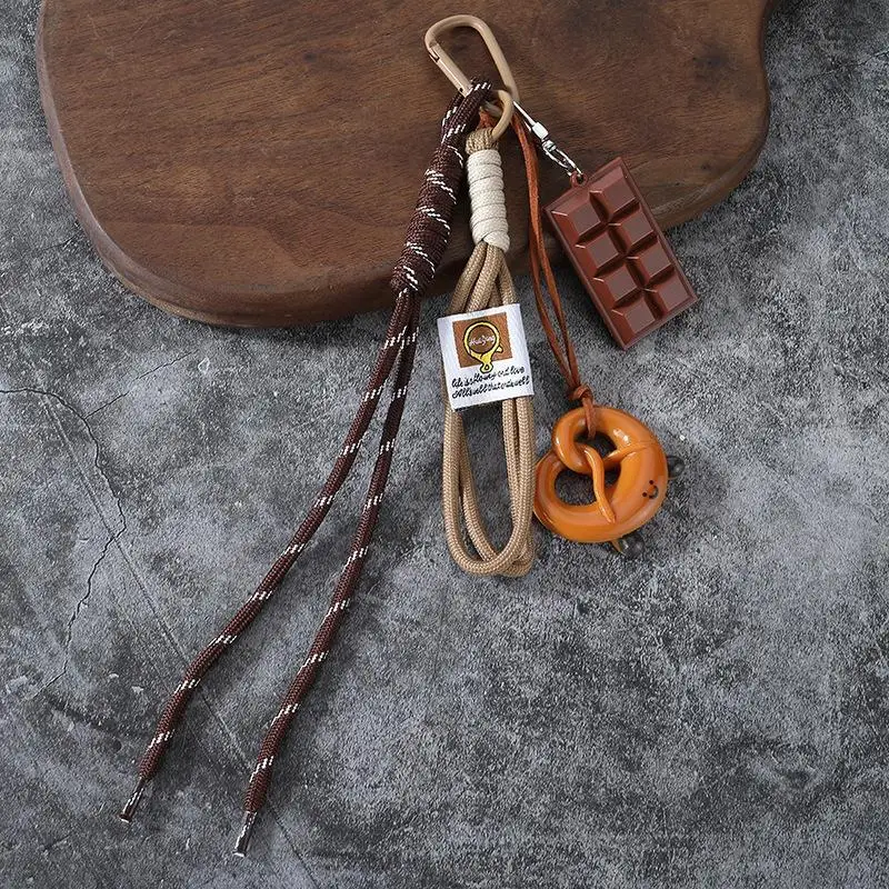 Niedlicher Schlüsselanhänger in Form von Cartoon-Lebensmitteln mit geflochtenem Seil und robustem Karabiner, perfekt zur Rucksackdekoration und für den täglichen Gebrauch. – Detail 3