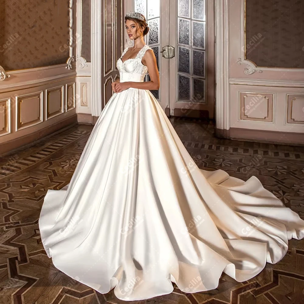 

Charming Wedding Dresses Elegant Bridal Gowns A Line Satin Robes Sleeveless Backless Robes Customized Vestidos De Novia 2026