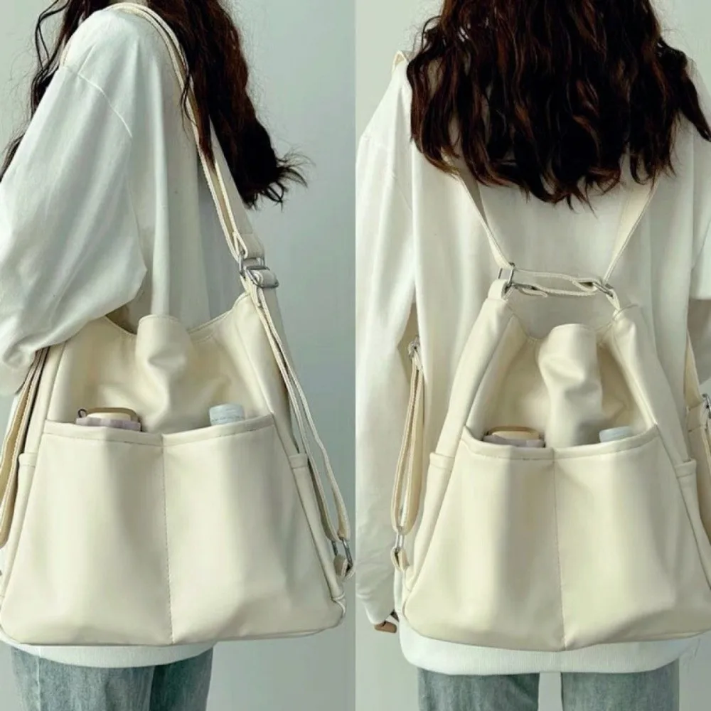 حقيبة ظهر كلاسيكية ذات سعة كبيرة للتنقل بلون سادة حقيبة يد للسفر حقيبة كتف عصرية بسيطة في الهواء الطلق