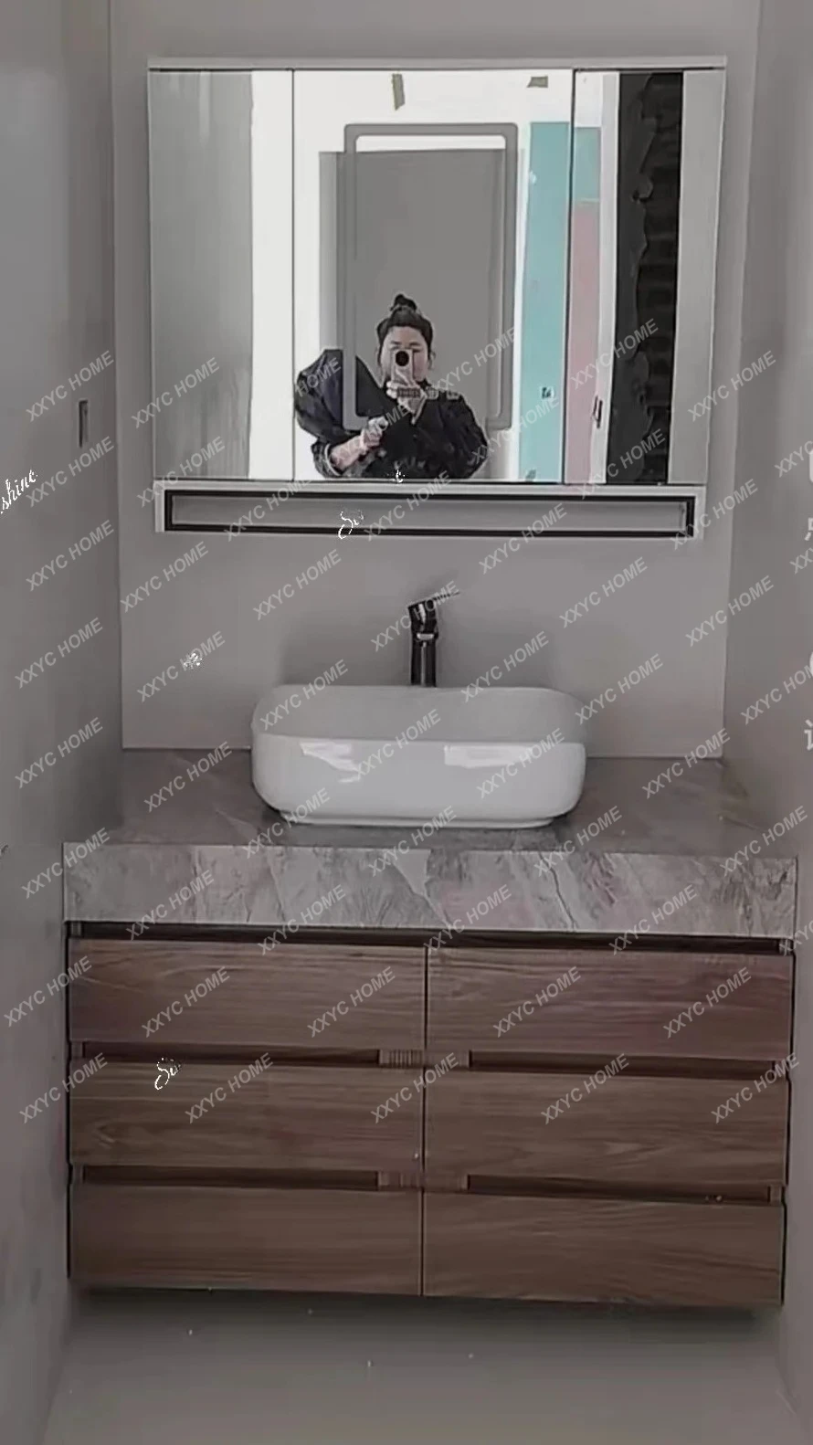 LSimple and modern, custom rock slab integrated basin sink