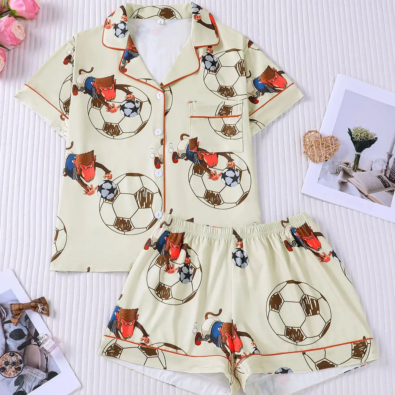 Rice white monkey soccer pajama set with contrasting orange edge collar design, short sleeved shorts, skin friendly home wear