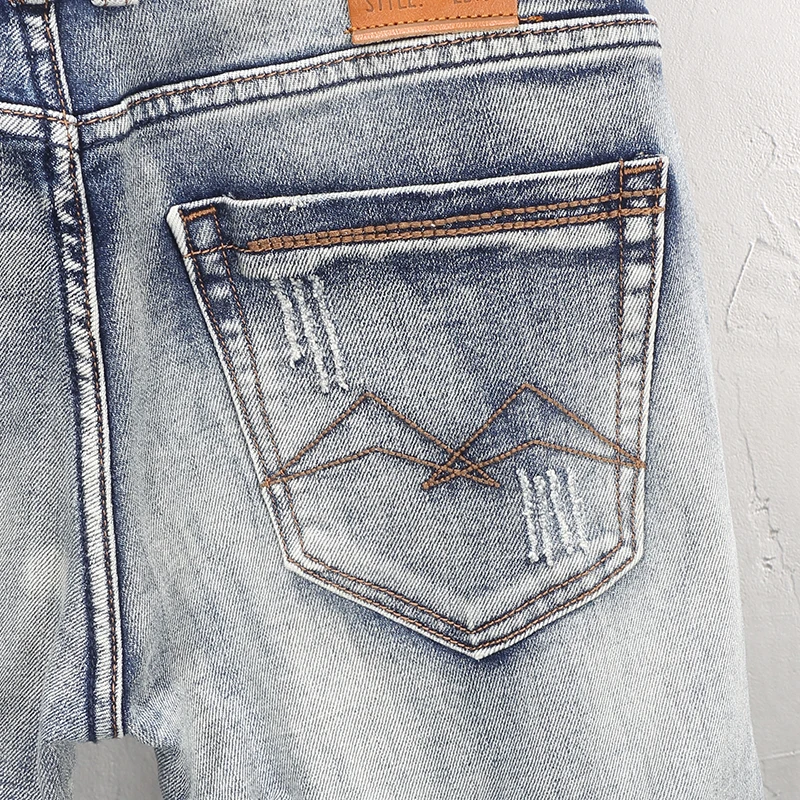 Fashion Vintage Men Jeans High Quality Retro Washed Blue Elastic Stretch Slim Fit Ripped Jeans Men Patched Designer Denim Pants