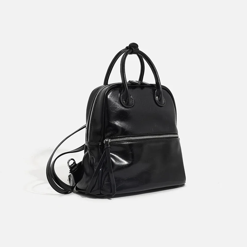 

Рюкзак унисекс из вощеной кожи 2025 года — просторная дорожная сумка для женщин, стильный пригородный рюкзак, прочный повседневный рюкзак