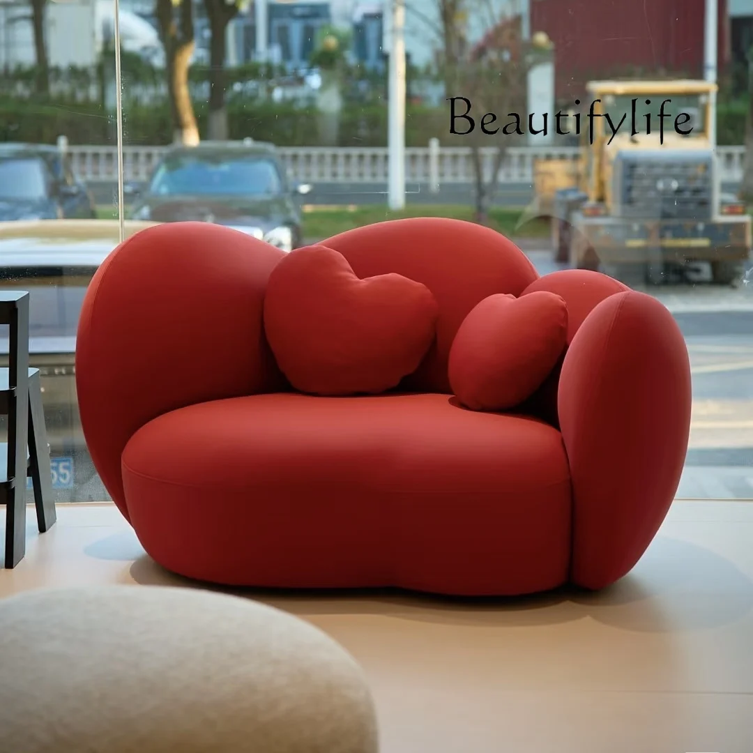 Arc-shaped special-shaped sofa, small light luxury designer clothing store, rest area, reception and negotiation