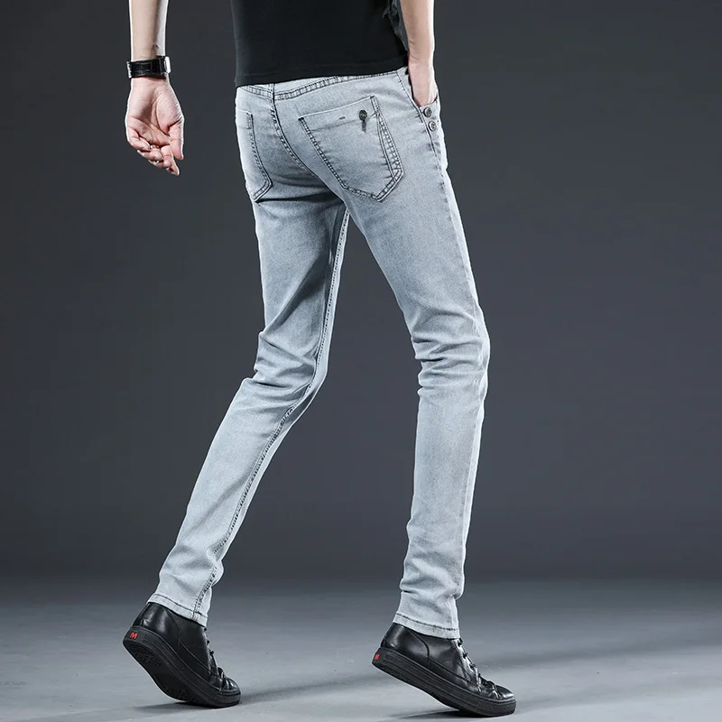 Nowe klasyczne designerskie modne męskie dżinsy skinny jasnoniebieskie sprane slim fit proste modne na co dzień bawełniane spodnie dżinsowe uliczne