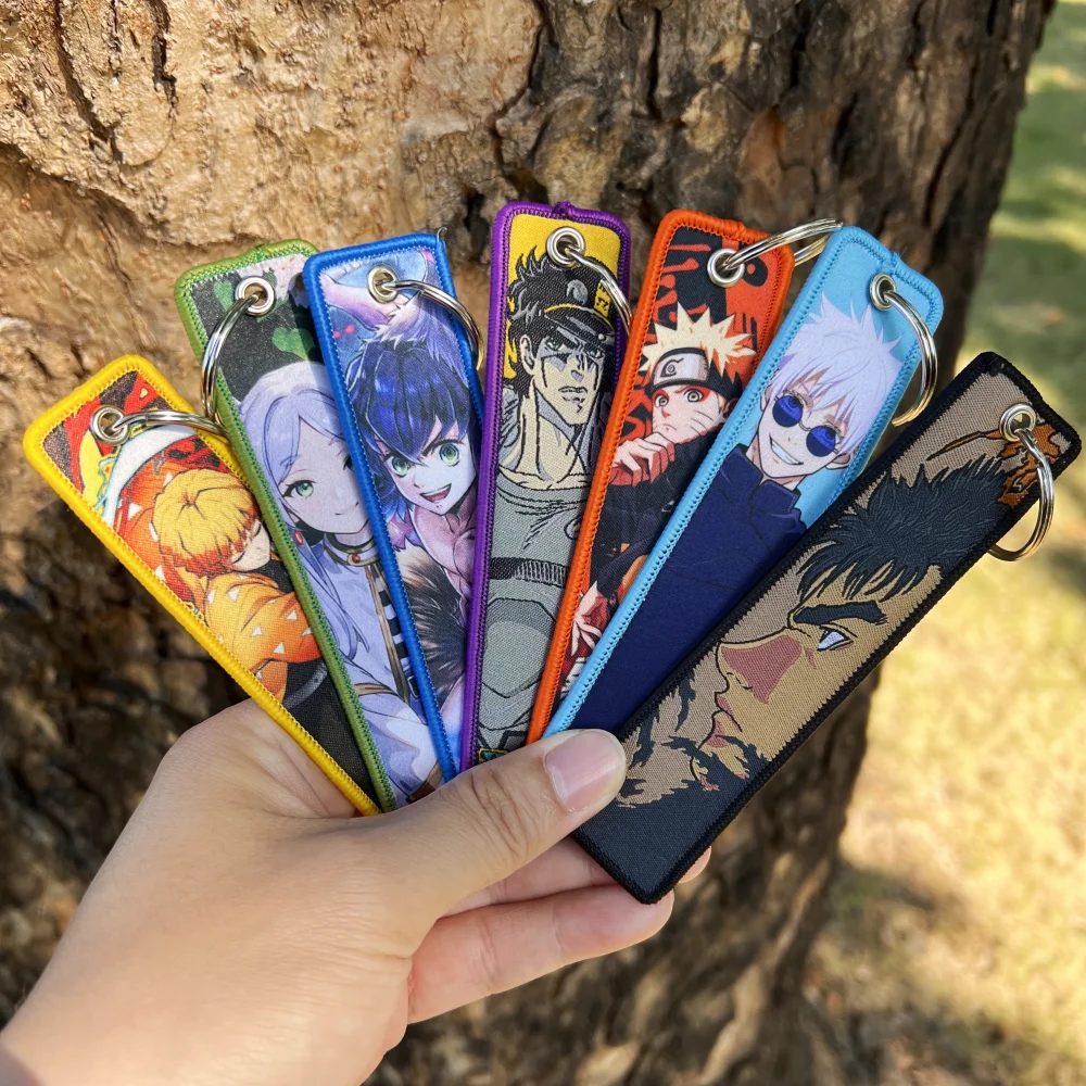 سلاسل مفاتيح أنيمي يابانية ، مانغا ميرش ، علامات نفاثة ، إكسسوارات دراجة نارية وسيارة ، هدايا تأثيري لسحر المفاتيح وحقائب الظهر