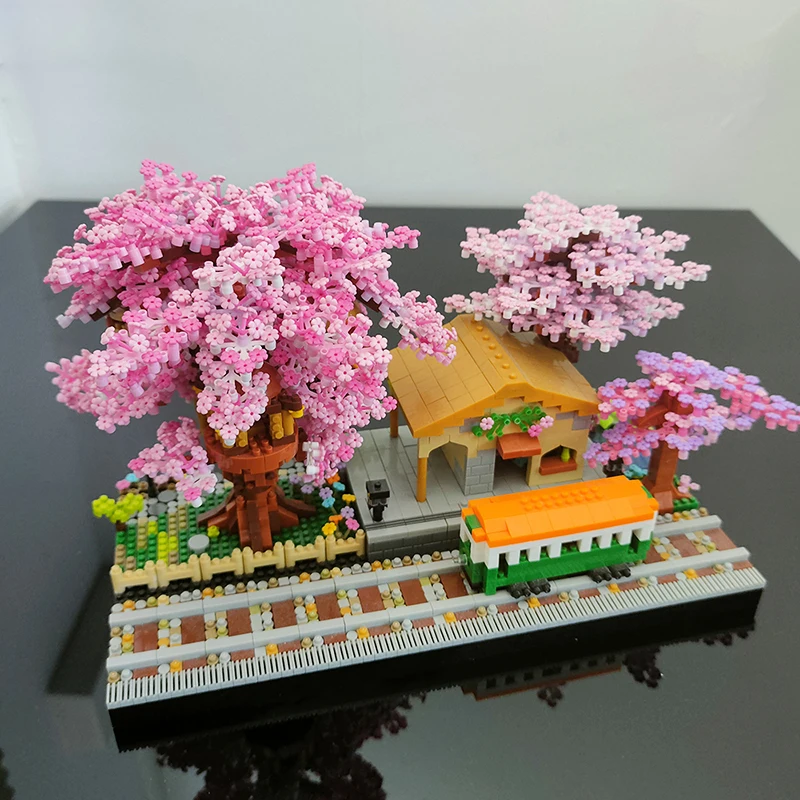 

600+PCS Mini Sakura Train Tree House Building Blocks City Street Assemble Bricks Toys with LED Light Gifts For Kids