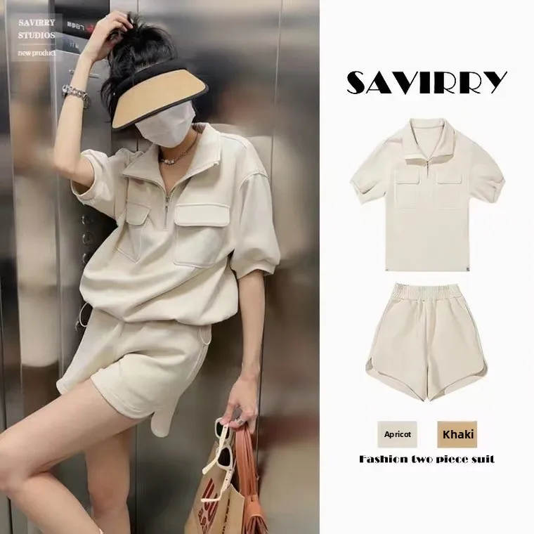 

Летний новый женский спортивный костюм: свободный повседневный комплект из хлопковой смеси с коротким рукавом, модный уличный стиль, антивозрастной свитшот и шорты.