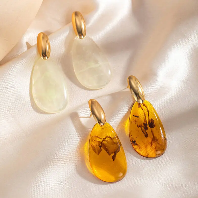 Irregular texture waterdrop stainless steel earrings for women, small-scale, titanium and steel jewelry for a niche market.