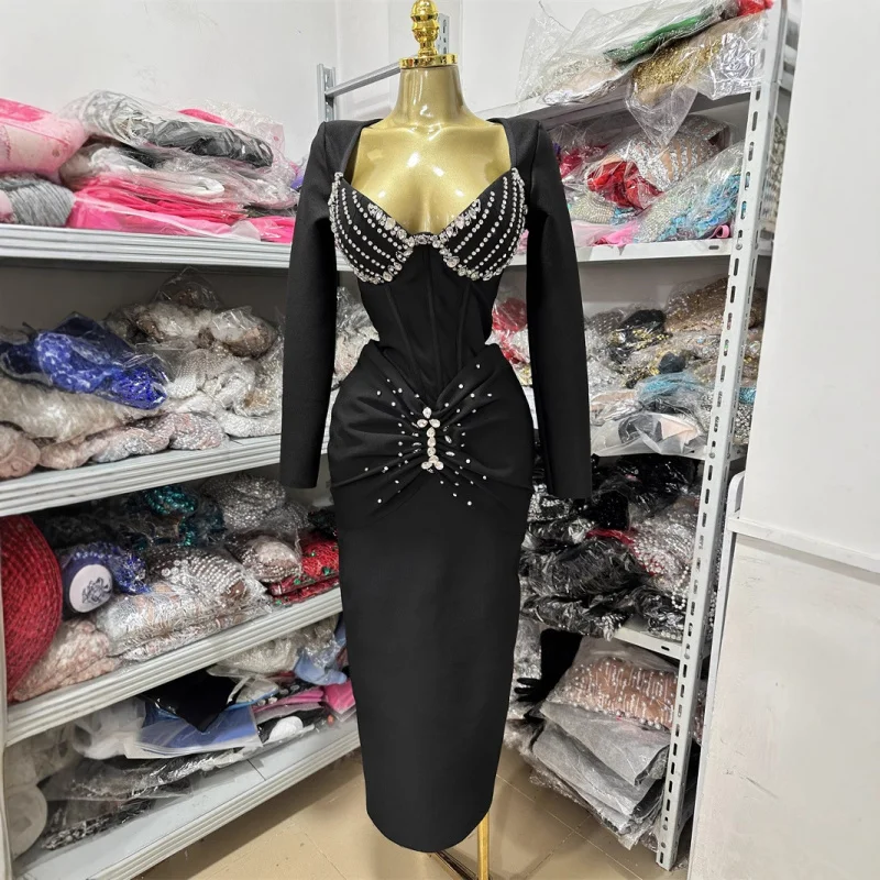 

Black long sleeved slim fit rhinestone V-neck slim slit design high-end pleated hip hugging long skirt