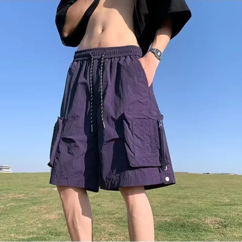 Pantalones cortos sueltos para hombre, pantalones cortos anchos con bolsillos y cordón, pantalones cortos Cargo lisos para hombre, ropa holgada con cintura elástica, Jorts de diseñador de lujo