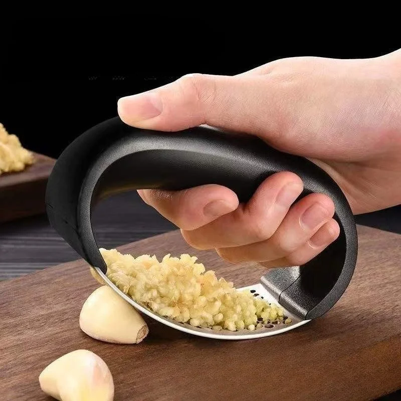 Stainless Steel Garlic Press & Chopper – Multi-Use for Fruits, Veggies, Easy Clean, Rustproof Kitchen Tool.