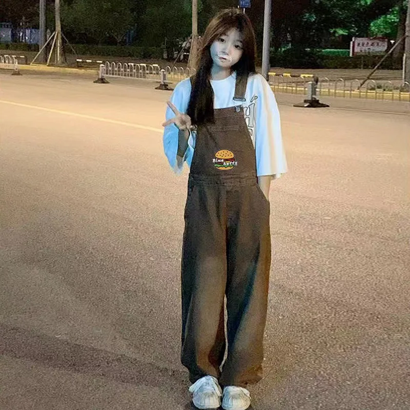 

Ретро-джинсовый комбинезон в американском уличном стиле, коричневый, женский, свободный, прямой крой, широкие штанины, стройнящий, длинные брюки, модный, с высокой талией...