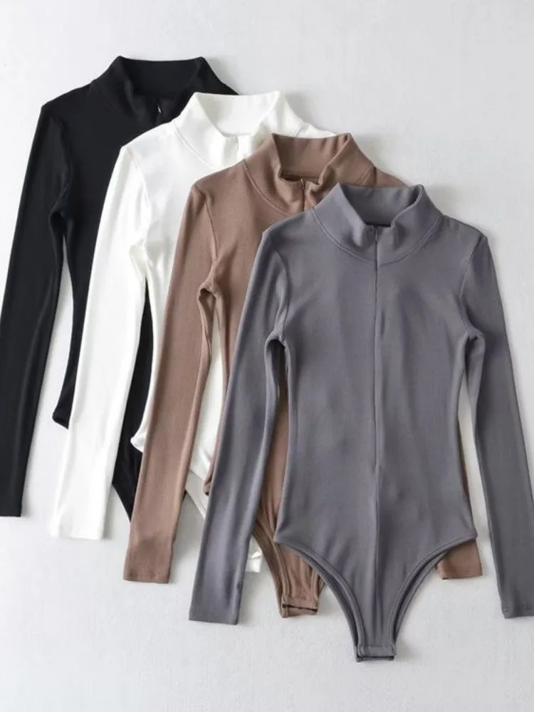 جمبسوت نسائي لربيع وخريف 2025 بدلة نسائية بقصة ضيقة وياقة ثابتة وتصميم بسحاب بلون سادة وأكمام طويلة طبقات علوية