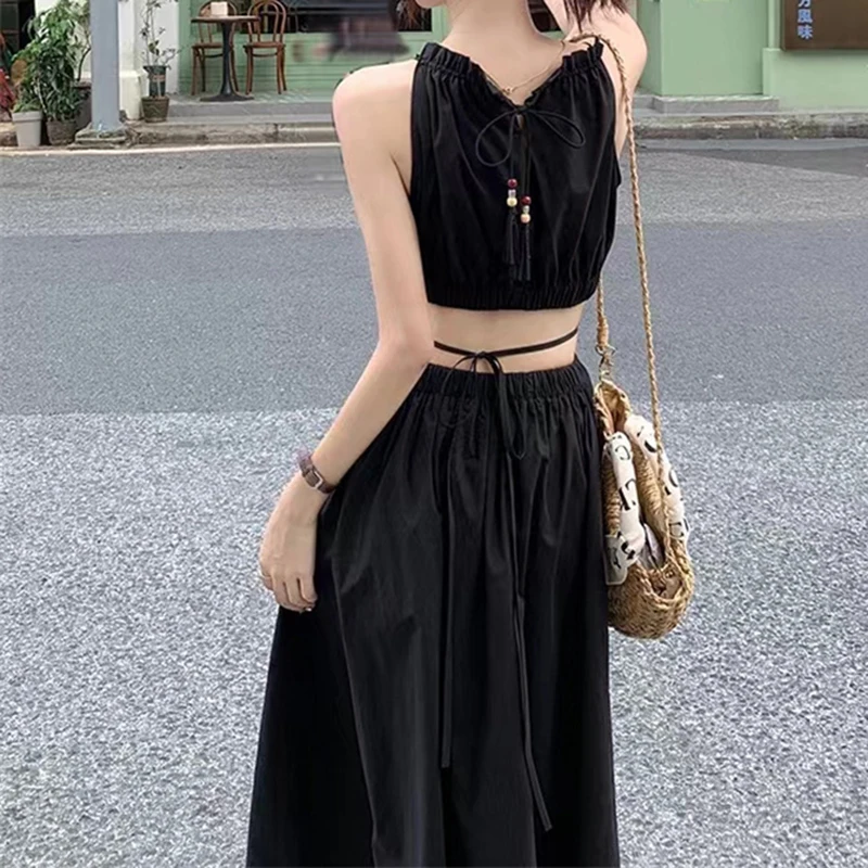 Fashion and Casual Summer Halter Hollow Sleeveless Tassel Solid Color Simple and Generous Hem Holiday Beach Women\'s Long Dress