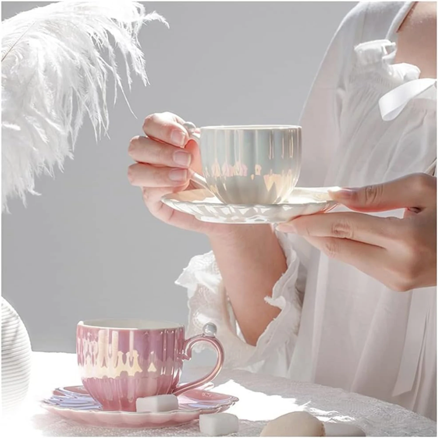 Enhance your coffee experience with this elegant and beautiful ceramic pearl shell coffee cup and saucer set. Perfect for sophis