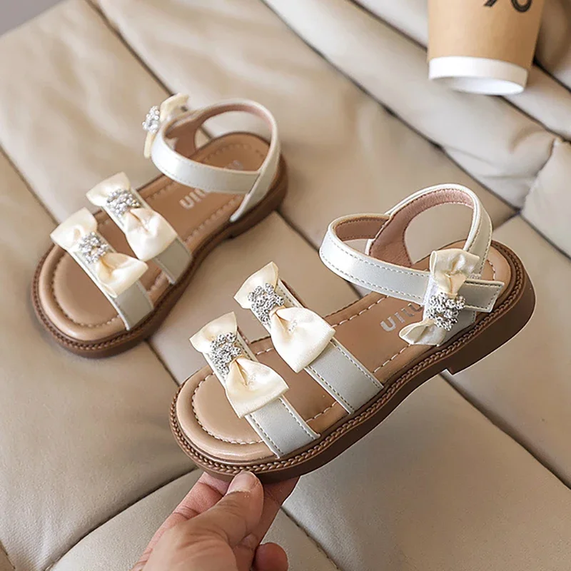

Summer New Children's Sandals Fashion Bow Rhinestone Girls' Princess Sandals Soft Sole Anti Slip Children's Open Toe Beach Shoes
